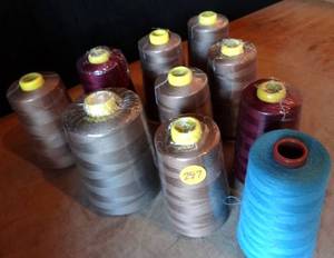 lot 297 image: 100 % POLYESTER SEWING THREAD (EMBROIDERY) 10 ROLLS ASSORTED COLORS AS SHOWN (APPROX 6000 YRDS EACH) 10x$