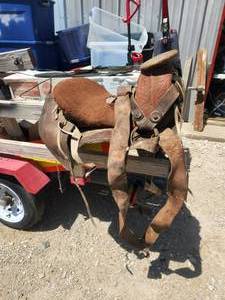 lot 112 image: Horse riding saddle and 3 halters