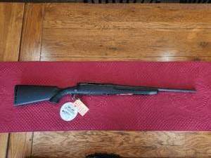 lot 43 image: Savage rifle - Ax15 - 243 Win caliber - has tags - appears to have never been fired