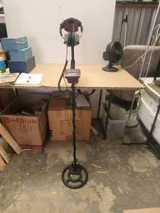 lot 98 image: Metal detector and headphones by White