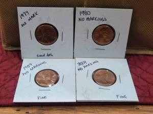 lot 21 image: Selection of 4 pennies with no markings - 1974. 80, 89, and 2009
