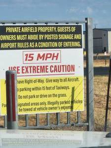 lot 6 image: Terms & Conditions - PARK PARRALLEL AND AS CLOSE TO HANGER AS POSSIBLE. YOU CAN ALSO PULL INTO HANGER.