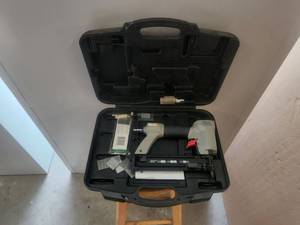 lot 15 image: Porter Cable air nail gun in case