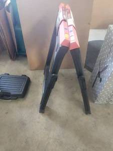 lot 16 image: Pair of Central Machinery folding sawhorses - never used