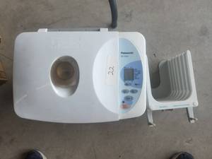 lot 22 image: Panasonic bread maker and a slicer