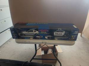 lot 31 image: Jada Heat radio-controlled cars - 07 Ford Shelby GT-500 and a 06 Dodge Charger Daytona RT - never opened