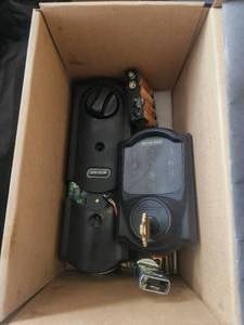 lot 35 image: Schlage programable door lock set - was removed from home - has key