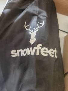 lot 36 image: Snowfeet - instantly turn you shoes into snow skis with carry bag