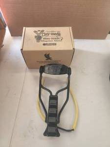 lot 38 image: Powerline Sling shot by the Daisey Company - and a box of ammo