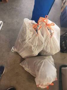 lot 200 image: Generous amount of plastic hangers