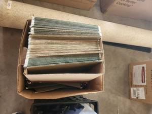 lot 99 image: Generous selection of green file folder holders