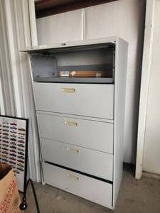 lot 69 image: Large lateral file cabinet with keys - needs a drawer repaired - has part for repair