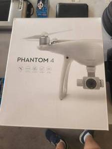 lot 76 image: Phantom 4 Drone, backpack carry case