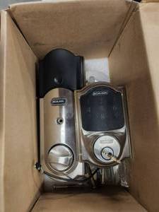 lot 81 image: Schlage programable door lock set - was removed from home - has key