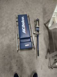 lot 168 image: AC Delco mechanics crawler and 2 14-ton trolley jack