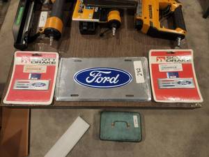 lot 242 image: Ford lot - 2 powered by Ford fender emblems and a Ford plate