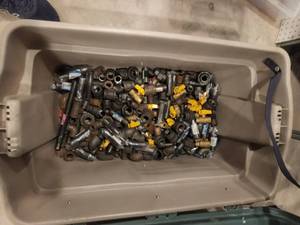 lot 215 image: Bin with gas line supplies and fittings