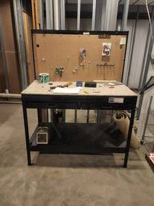 lot 211 image: Multipurpose workbench with outlets - contents included