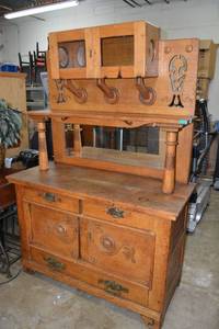 lot 4 image: Antique Oak Kitchen Buffet Hutch with Carved Wood Accents and Mirror