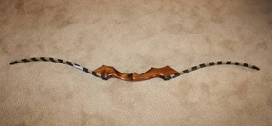 lot 2 image: Hand-made Recurve Bow - 62.5 length unstrung needs a string