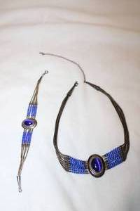 lot 110 image: Sterling silver multi strand liquid bead Cats Eye cabochon 16L necklace and matching 7L bracelet set. Both marked Mexico 925. Side cones also marked same.