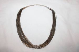 lot 113 image: Sterling silver liquid bead 50-strand 18.5L necklace. Cones marked Sterling