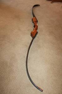 lot 12 image: Hand-made Recurve Archery Bow - 56.5 length unstrung needs a string