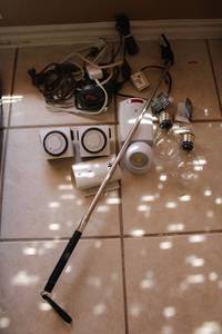lot 32 image: Decorative Solar Lights, Selfie Stick, Light Timers, Extension Cords