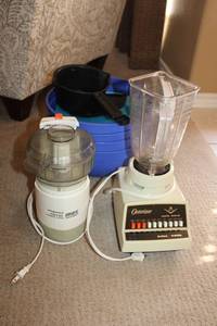 lot 34 image: Osterizer Blender, Presto Food Processor, Large Plastic Bowls and Plates