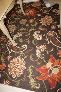 lot 39 image: Area Rug 7ft. X 9ft. By Cleo Wool, Hand Hooked, made in India, Brown and Floral