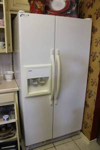 lot 56 image: Kenmore Coldspot Refrigerator Freezer 36W x 34D x 70H, Model 106.54512300  CONTENTS NOT INCLUDED
