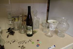 lot 64 image: Crystal Vase, Decanter, Glass Vases, Wine Bottle charms, and Decorative Light-Up Wine Bottle