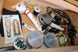lot 90 image: Misc. Lot Sewing Awl, CDs, CD Player, Earbuds