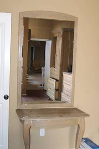 lot 93 image: Mirror (34.5W x 54.5H) and 2-Legged Table mounts to wall (37W x 21D x 29H) Set