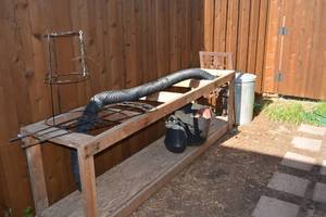 lot 168 image: Large Wood Outdoor Garden Plant Unit, Trellises, and Garden Hose