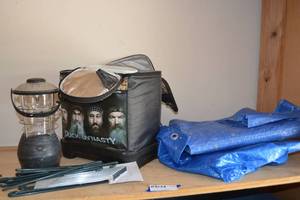 lot 150 image: Duck Dynasty Lunch Cooler, Lantern, Tarp, Tent Stakes