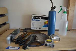 lot 146 image: Tools Circular Saw Blades, Propane Torch, Level, Clamp, Tape Measures, and Scissors