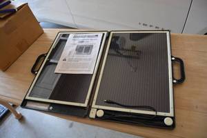 lot 141 image: Portable Solar Charger Model 95000