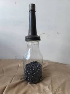 lot 9 image: Vintage oil spoutfunnel on glass jar