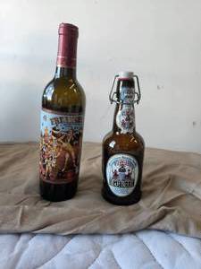 lot 15 image: Selection of 2 Bar decor bottles - Freakshow wine and Virgils Root beer