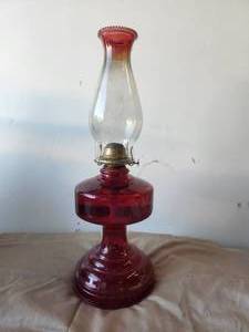 lot 19 image: Vintage ruby red and clear Hurricane oil lamp