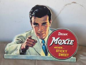 lot 22 image: Vintage drink Moxie cardboard wall sign