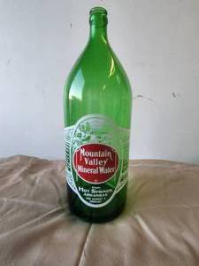 lot 43 image: Vintage Mountain Valley Mineral Water Green glass bottle