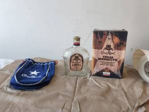 lot 45 image: Collectible Crown Royal-Texas Mesquite bottle, box and pouch