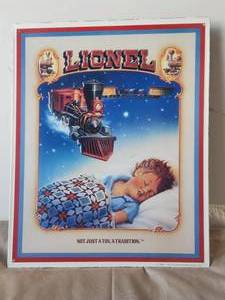 lot 63 image: Vintage Lionel Not just a Toy, A Tradition metal advertisement sign
