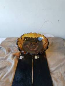 lot 70 image: Vintage Indian Amber glass sunflower - 3 footed - 11