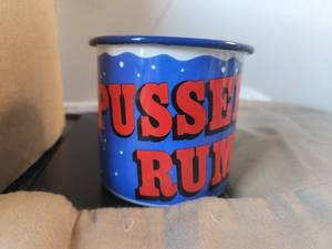 lot 74 image: Box of 12 metal Pussers Rum coffee cups