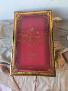 lot 75 image: Budweiser Millennium Limited Edition Bottle set - 1 qt bottle, 4 glasses - never opened - being sold as a collectible not for consumptions