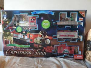 lot 78 image: North Pole Junction Christmas Train set - 34-piece train set