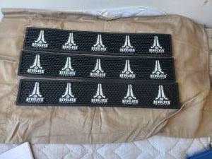 lot 100 image: Selection of 3 Revolver bar mats